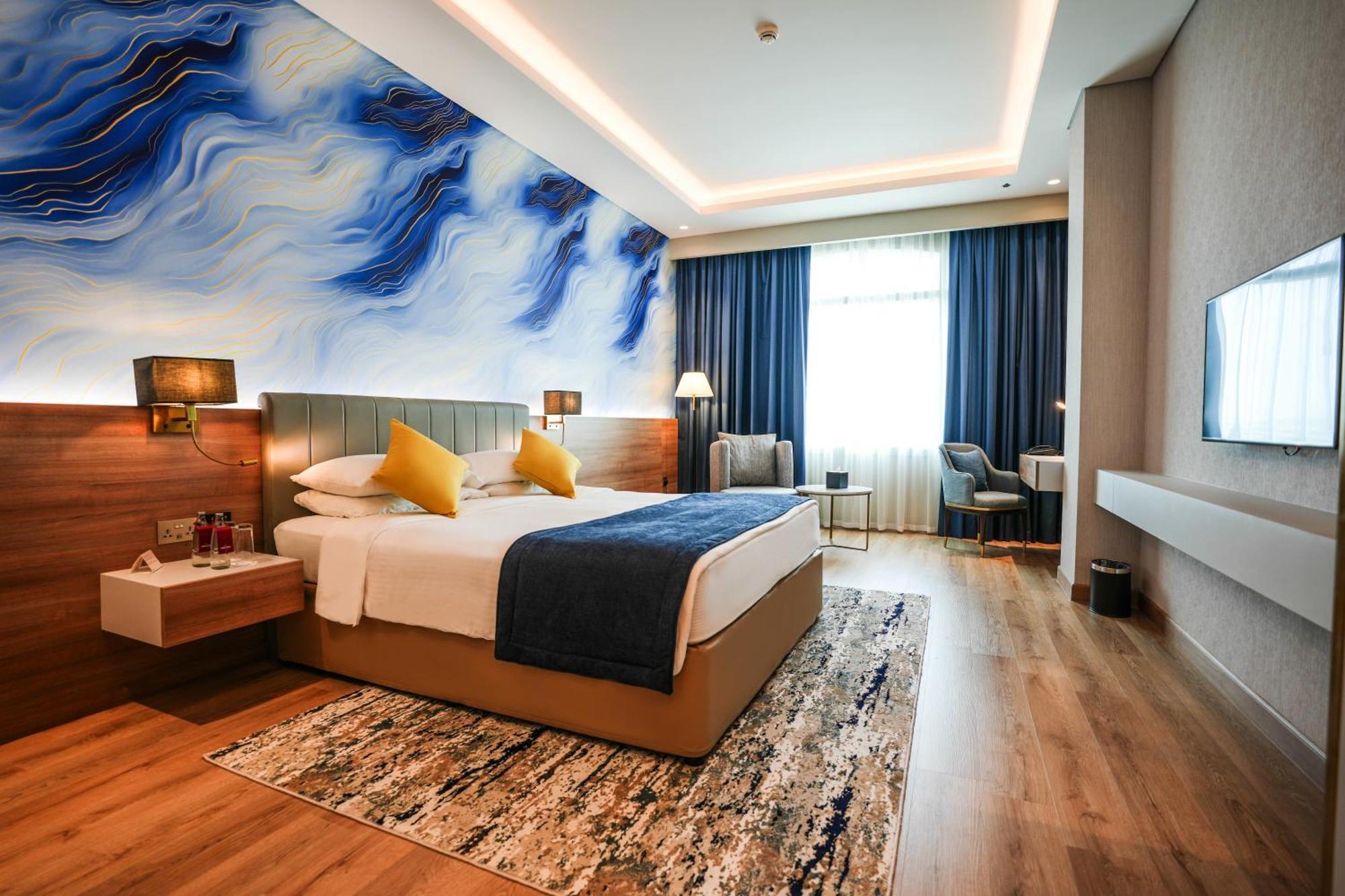 Hotel Mövenpick Grand Al Bustan Dubai Exterior foto Deluxe Room